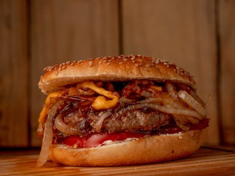 Customized In-N-Out double cheeseburger with Animal Style toppings - grilled onions, special sauce, and melted cheese